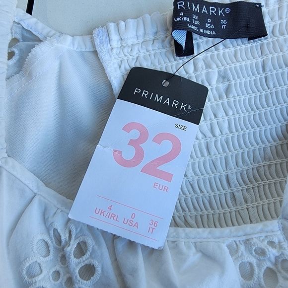 NWT Primark Women’s White Eyelet Knee Length Dress With Puff Sleeves Cotton Sz 0 - Picture 12 of 14